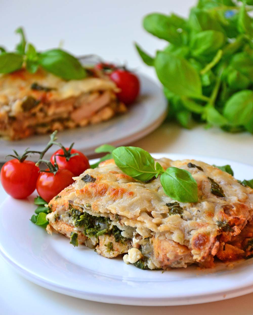 White lasagna with chicken, bacon and spinach